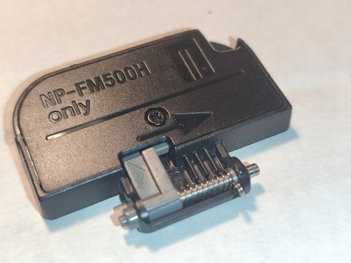 Sony alpha battery door - battery,